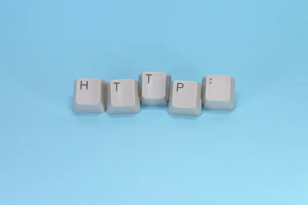 Keyboard keycaps spelling out http: